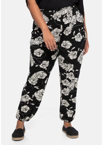 Große Größen Jerseyhose im Joggpants-Stil, mit Alloverprint Gr. 50 schwarz von sheego für Damen