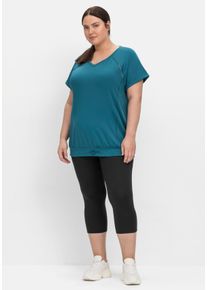 Große Größen Sportleggings in Caprilänge, mit Print am Bein Gr. 40 schwarz von sheego für Damen