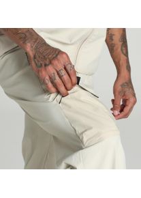 Puma Herren Sporthose "PumaTECH Relaxed Cargohose Herren", beige, Gr. XS, unifarben, Obermaterial: 6% Elasthan, 94% Nylon; Aufgesetzte Tasche: 50%