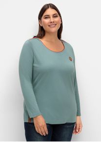 sheego Große Größen Langarmshirt mit Lederimitat-Emblem, jade, Größe 42 - Damen
