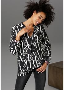 Schlupfbluse Aniston CASUAL, Damen, Gr. 38, schwarz-wei&szlig; (schwarz, wei&szlig;, rot), Web, Obermaterial: 100% Viskose, bedruckt, l&auml;ssig geschnitten Po-bedeckend, V-Ausschnitt, 1-Knopf-Manschette, Blusen Schlupfbluse, mit Buchstaben bedruckt, Topseller