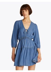 Blusenkleid Tommy Jeans "TJW CHAMBRAY MINI DRESS EXT", Damen, Gr. XS (34), N-Gr, blau (denim medium), Web, Obermaterial: 100% Lyocell, unifarben, ausgestellt mini, V-Ausschnitt, elastischer Bund, Kleider Blusenkleid, mit Volant, in Mini-L&auml;nge