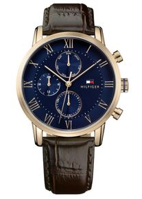Die Tommy Hilfiger Herrenuhr ist das perfekte Geschenk, um sich selbst oder einen geliebten Menschen zu verw&ouml;hnen. Das runde Geh&auml;use aus Edelstahl wird von einem hochwertigen Quarzwerk im Multi-Cadrans-Stil angetrieben. Diese Dressed-Uhr hat einen Durchmesser von 44 mm. Das braune Lederarmband mit Dornschlie&szlig;e macht sie zu einer angenehm zu tragenden Uhr. Bei 3 bar ist diese Uhr nicht nur modisch,